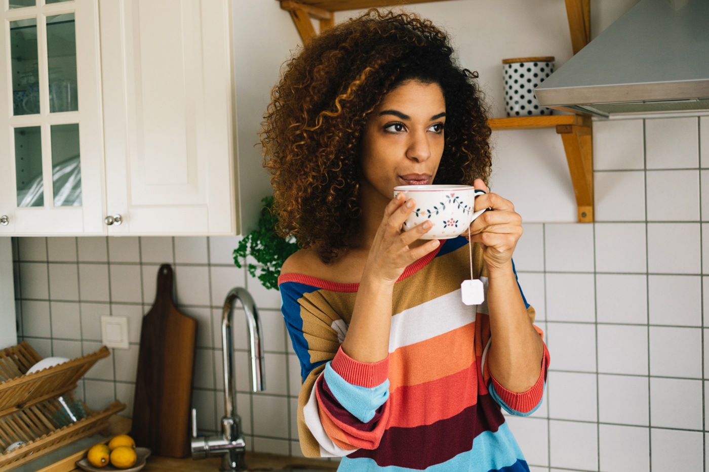 GettyImages woman drinking tea humanmade